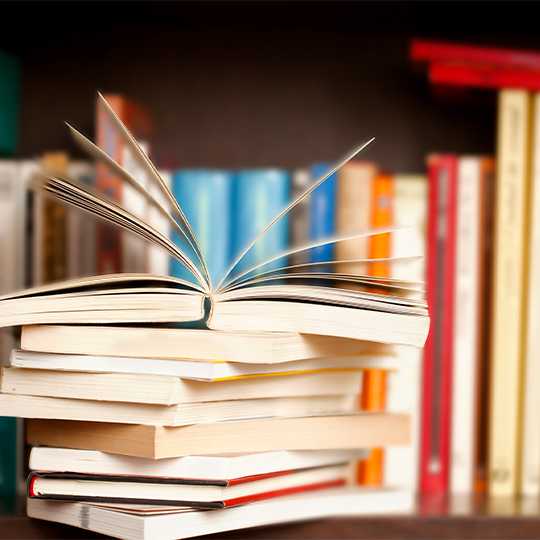 Stack of books on a shelf